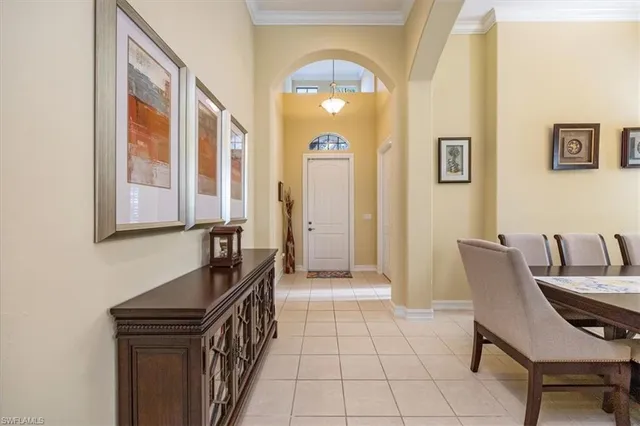 a view of a livingroom with furniture and front door