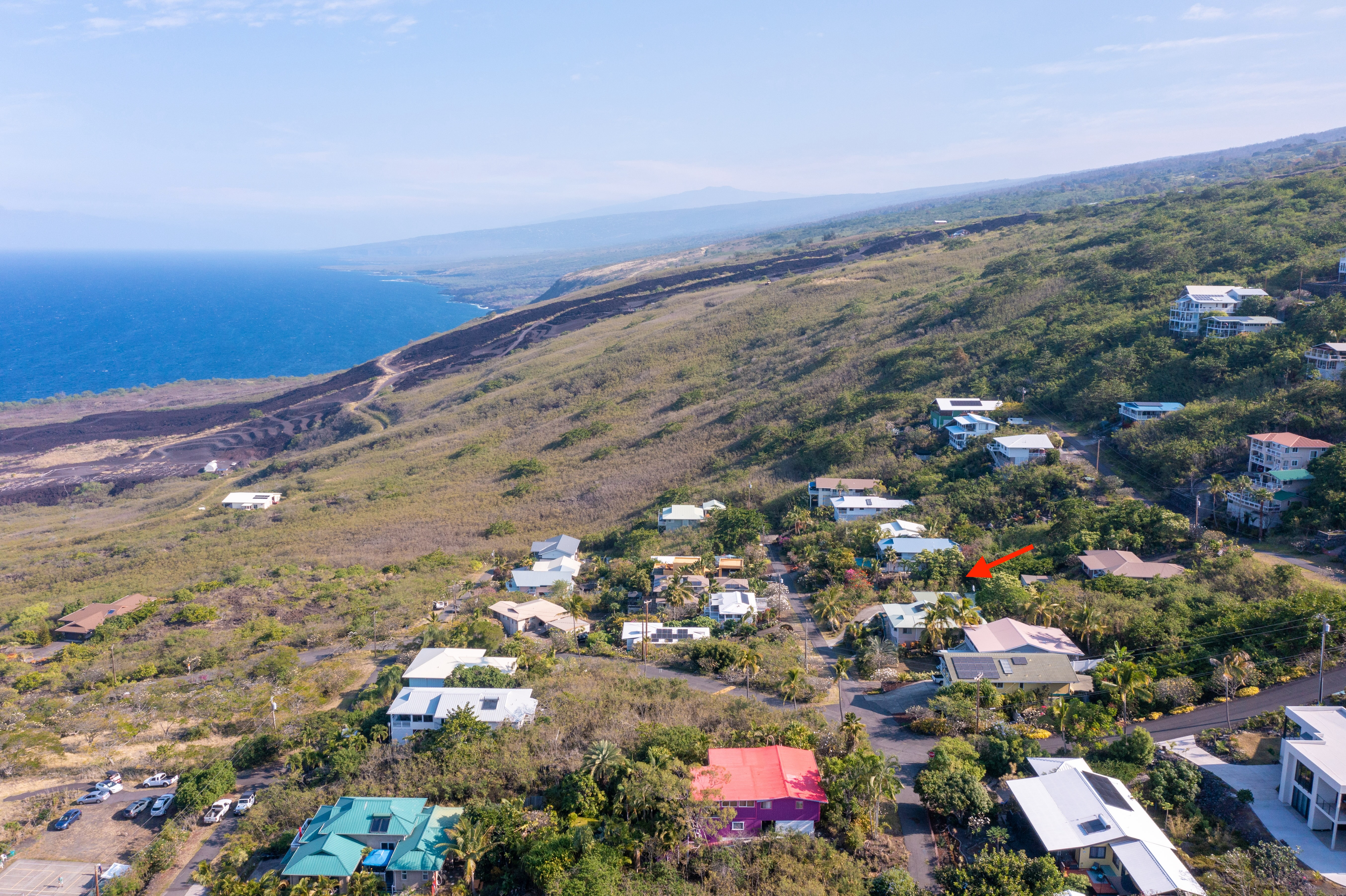 174 Guava Road Captain Cook, HI 96704 - Photo 1 of 16 an aerial view of a city