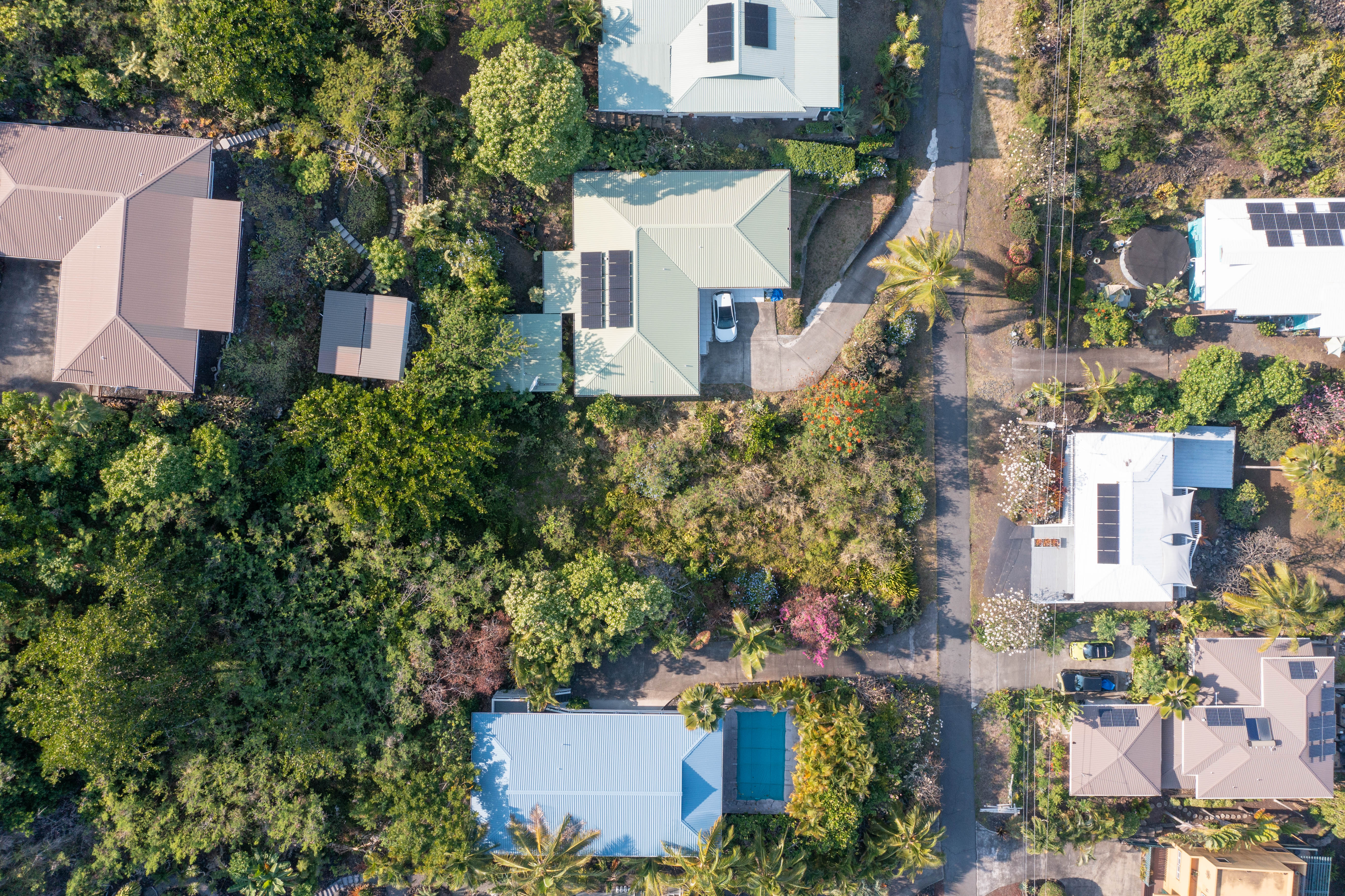 174 Guava Road Captain Cook, HI 96704 - Photo 12 of 16 an aerial view of a house with a yard and fountain