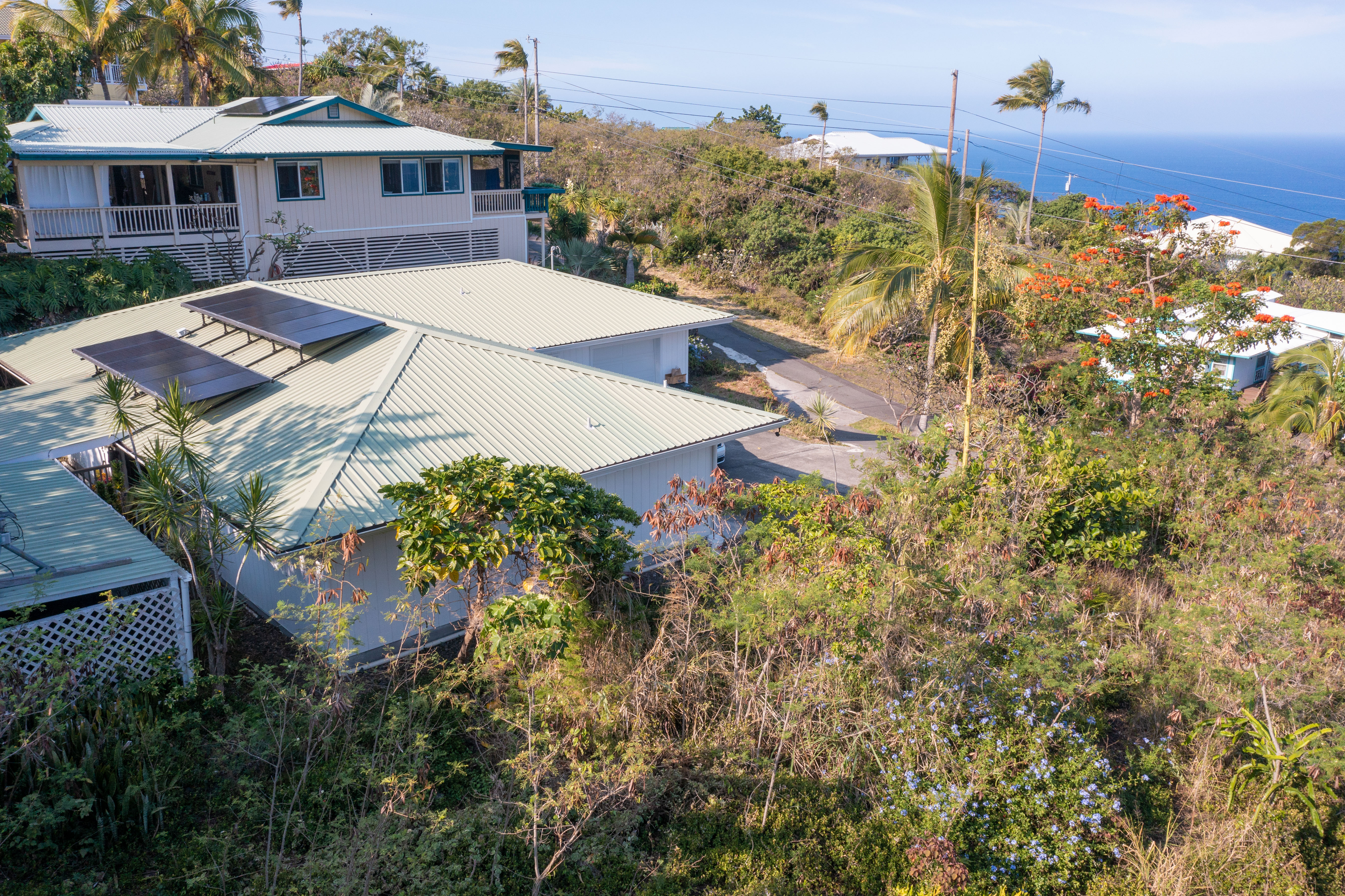 174 Guava Road Captain Cook, HI 96704 - Photo 13 of 16 an aerial view of a house with a yard