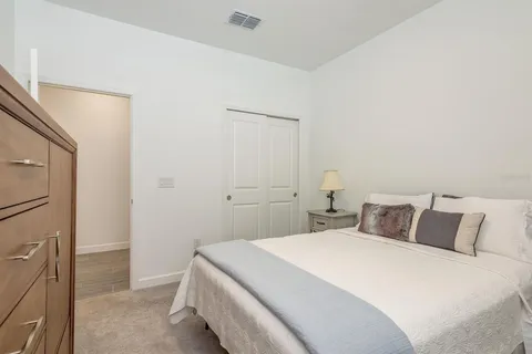 a view of an chairs and table in the patio