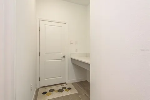 a view of a house with backyard