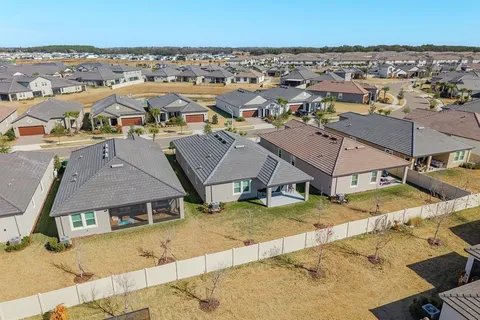 a view of outdoor space with swimming pool and seating