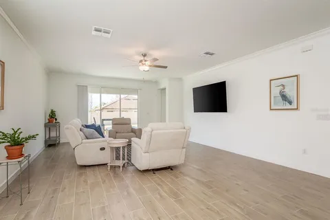 a kitchen with a refrigerator and a sink