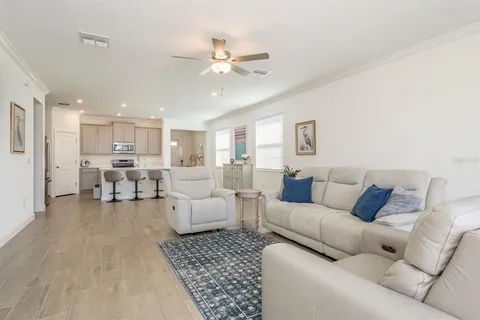 a kitchen with stainless steel appliances a refrigerator stove microwave and cabinets