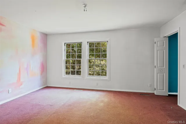 an empty room with a window