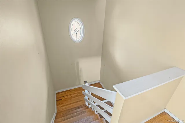 a view of room with wooden floor