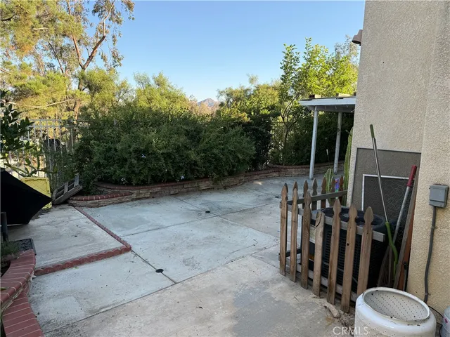 a view of a porch with furniture