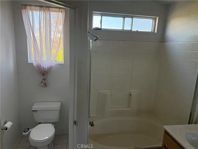 an empty room with an entryway door