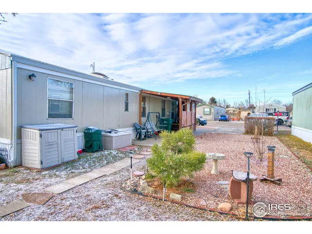 a view of living room filled with furniture and a yard