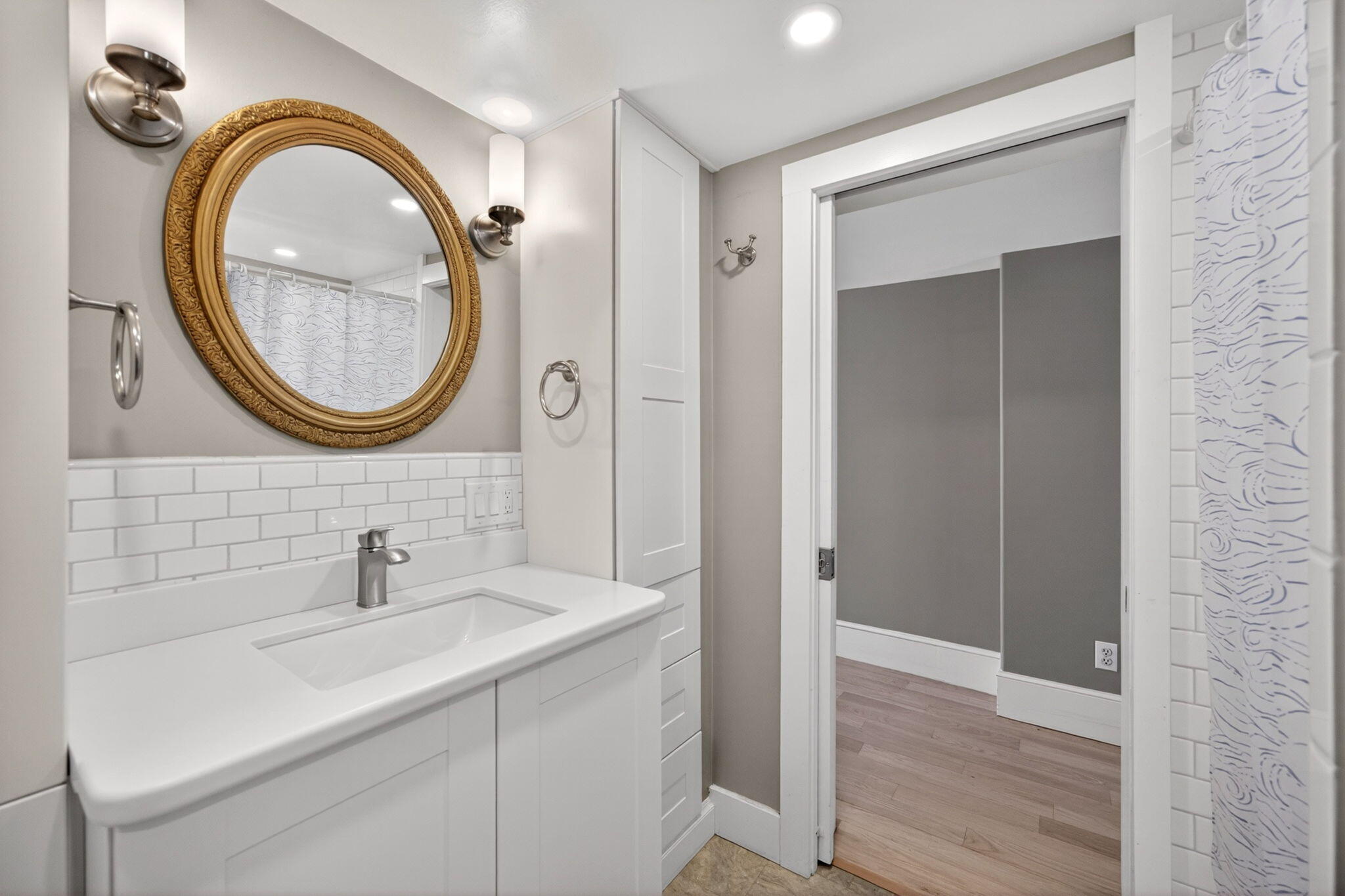 69 County Road Bourne, MA 02532 - Photo 35 of 54 a bathroom with a sink and a mirror