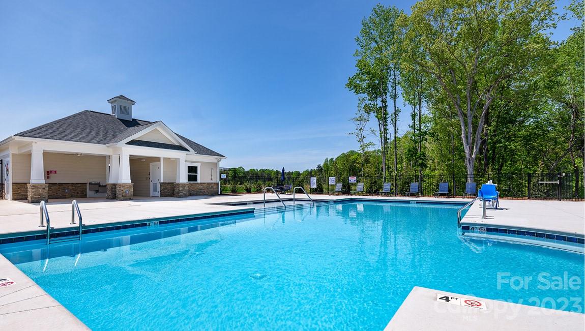 7899 Iron Road Sherrills Ford, NC 28673 - Photo 33 of 41 a front view of a house with swimming pool