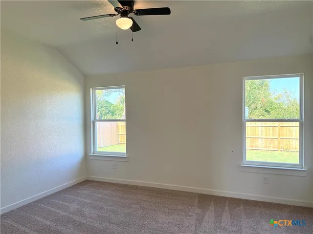 a bathroom with a tub and a sink