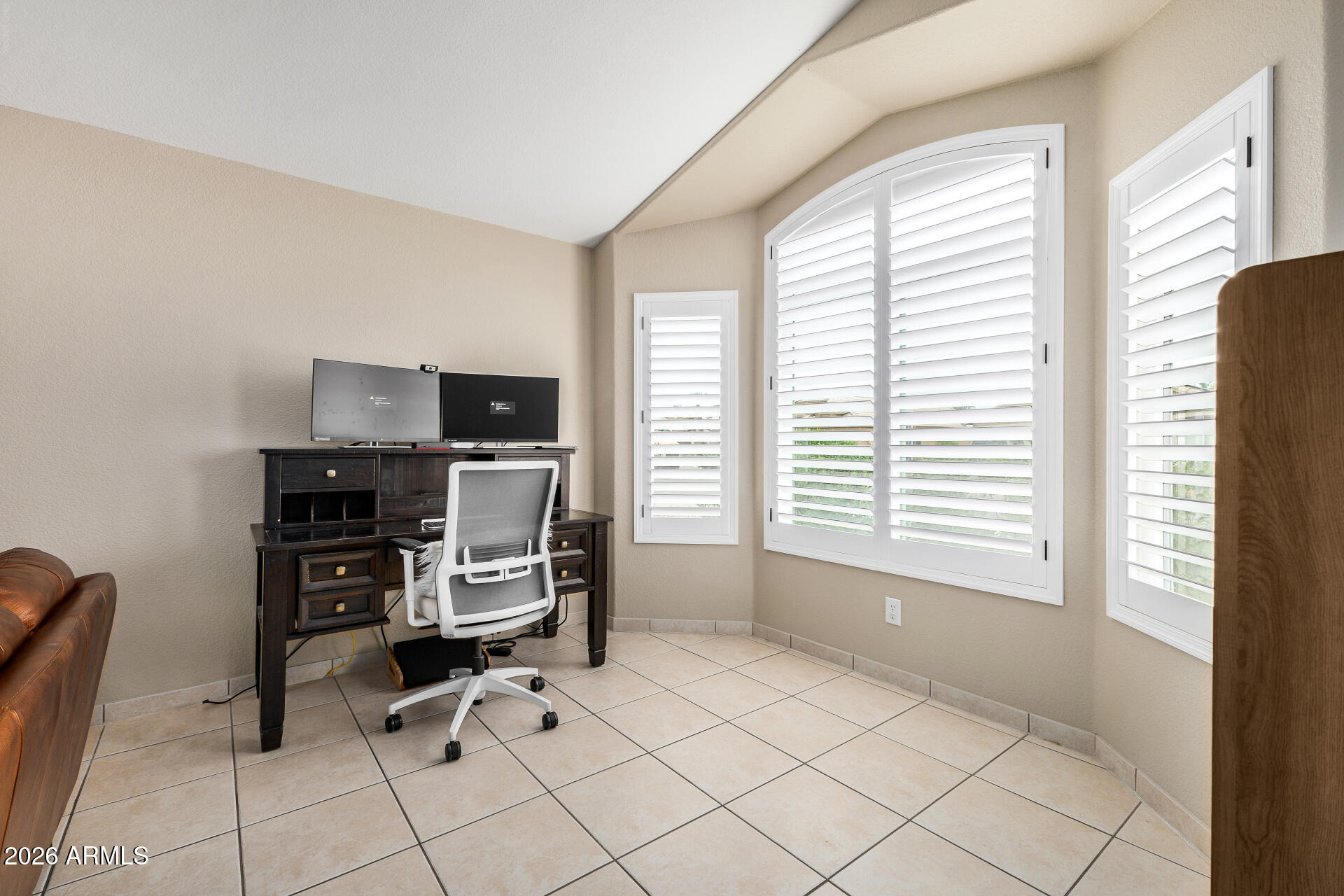 159 West Gail Drive Gilbert, AZ 85233 - Photo 11 of 46 a view of a workspace with furniture and a window