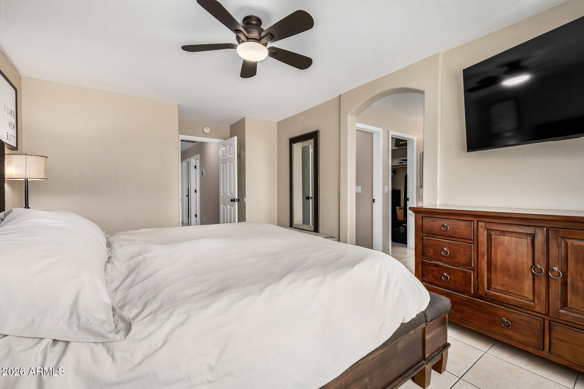159 West Gail Drive Gilbert, AZ 85233 - Photo 29 of 46 a bedroom with a bed and a flat screen tv