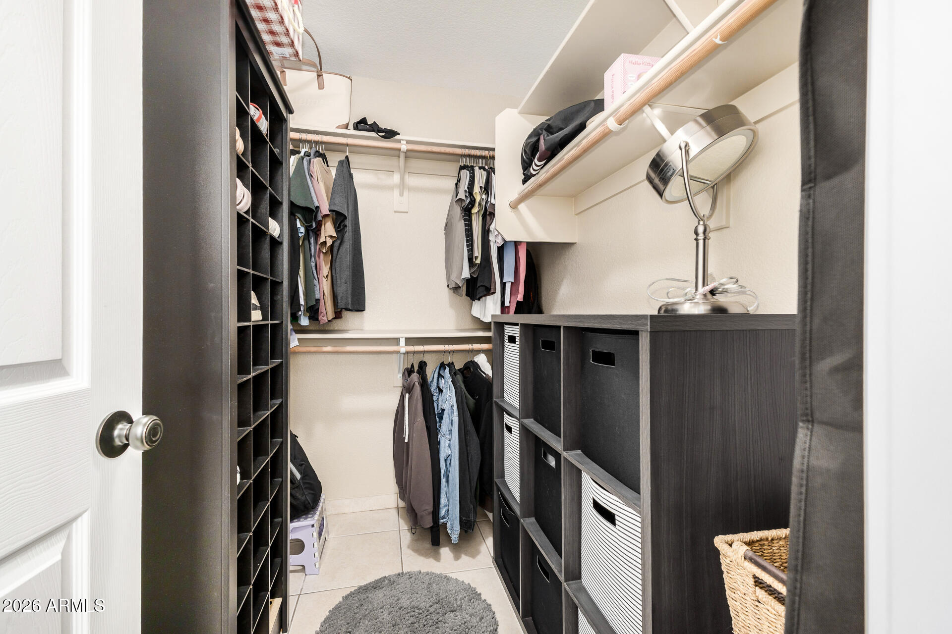 159 West Gail Drive Gilbert, AZ 85233 - Photo 33 of 46 a view of walk in closet with clothes and shoes