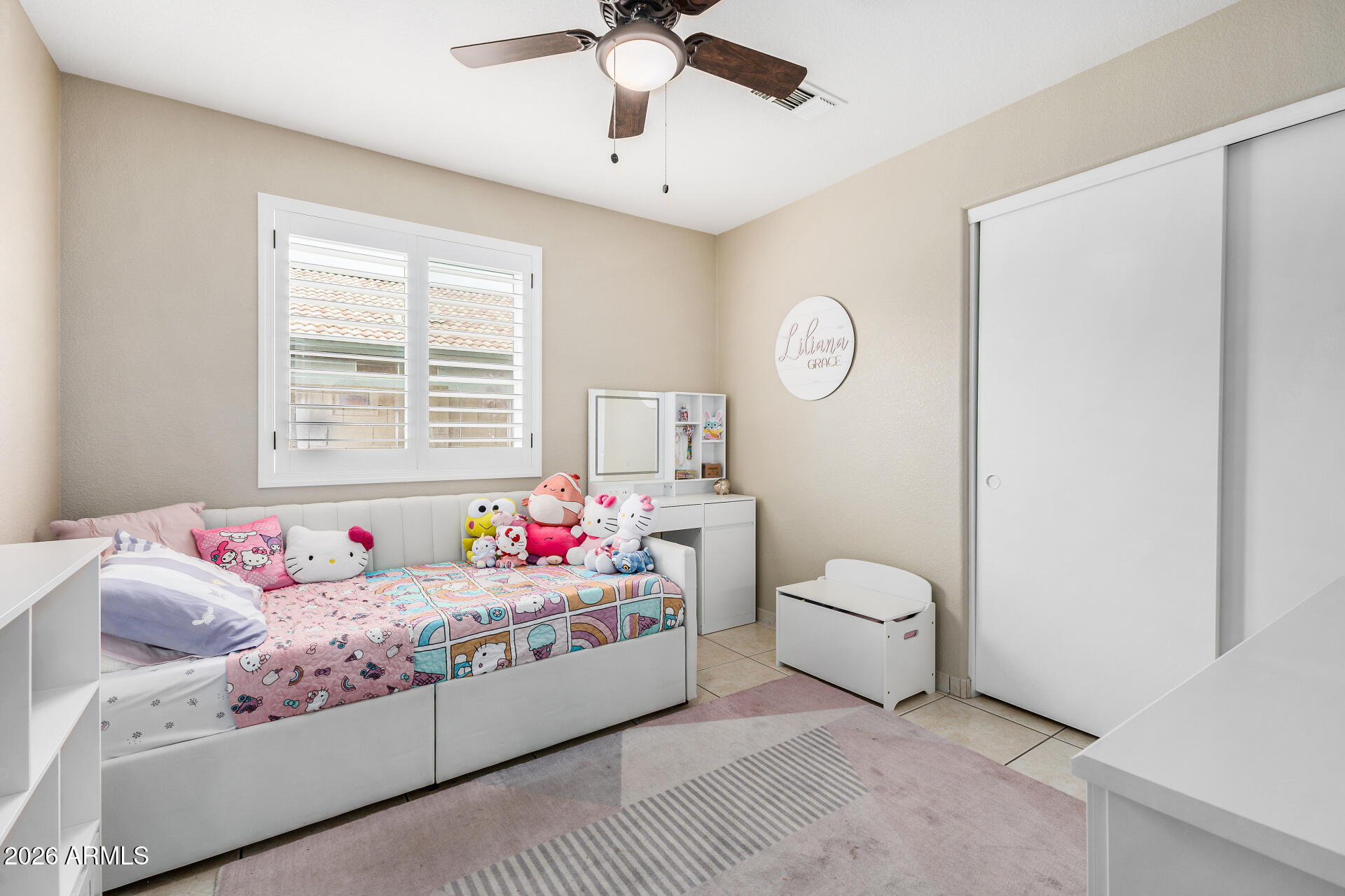159 West Gail Drive Gilbert, AZ 85233 - Photo 37 of 46 a bedroom with a bed and a chandelier