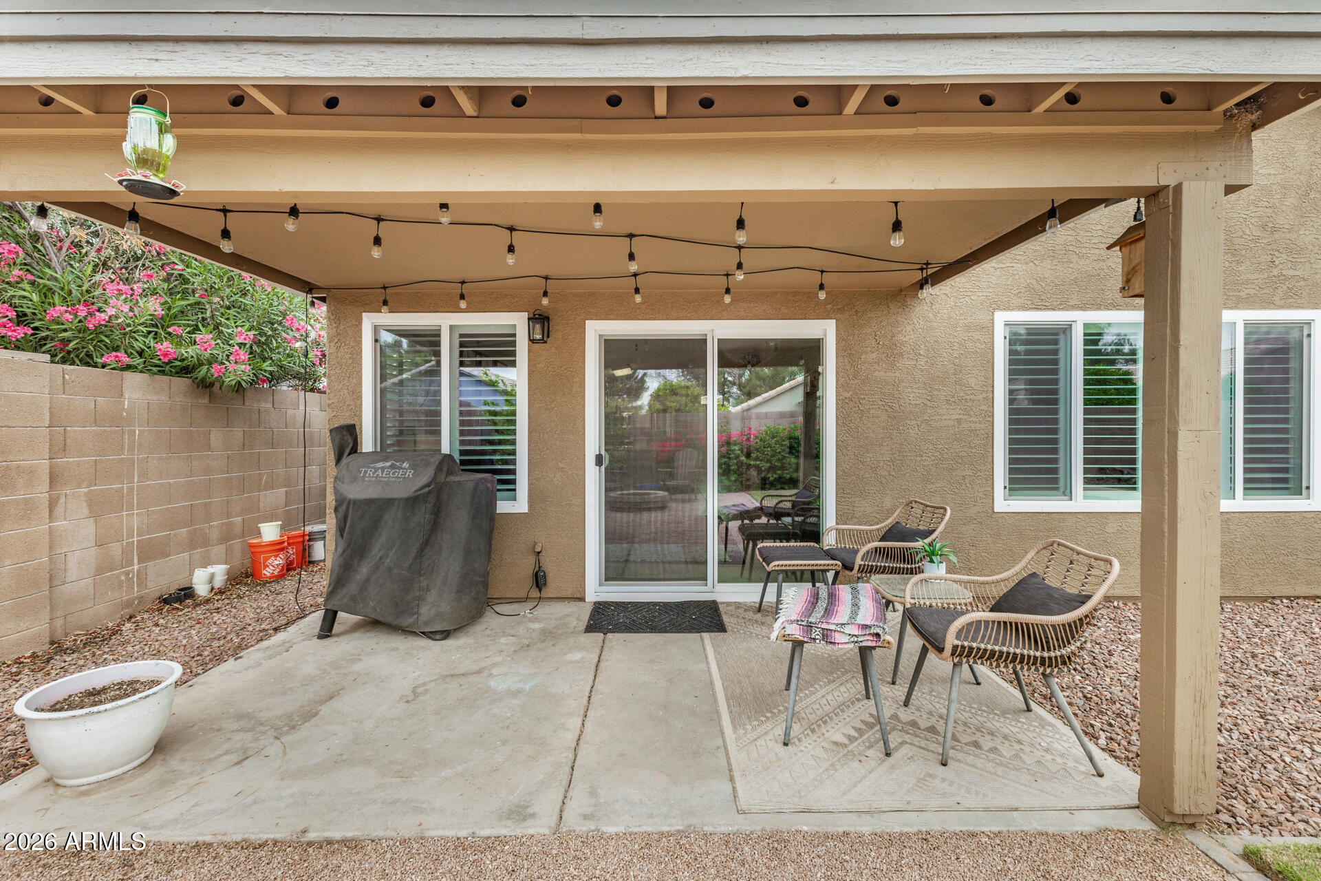 159 West Gail Drive Gilbert, AZ 85233 - Photo 43 of 46 a living room with furniture and a potted plant