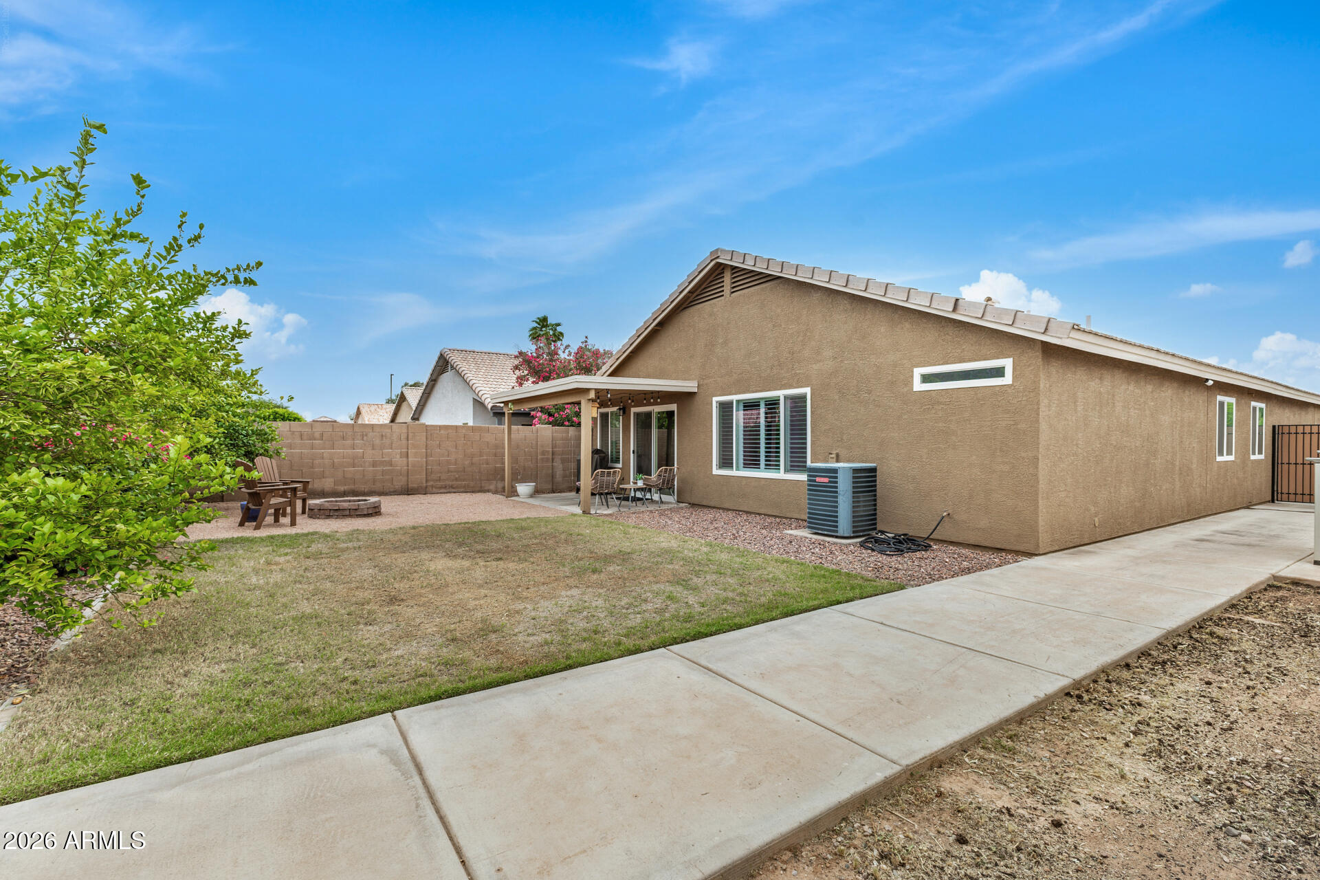 159 West Gail Drive Gilbert, AZ 85233 - Photo 46 of 46 a house view with a backyard space