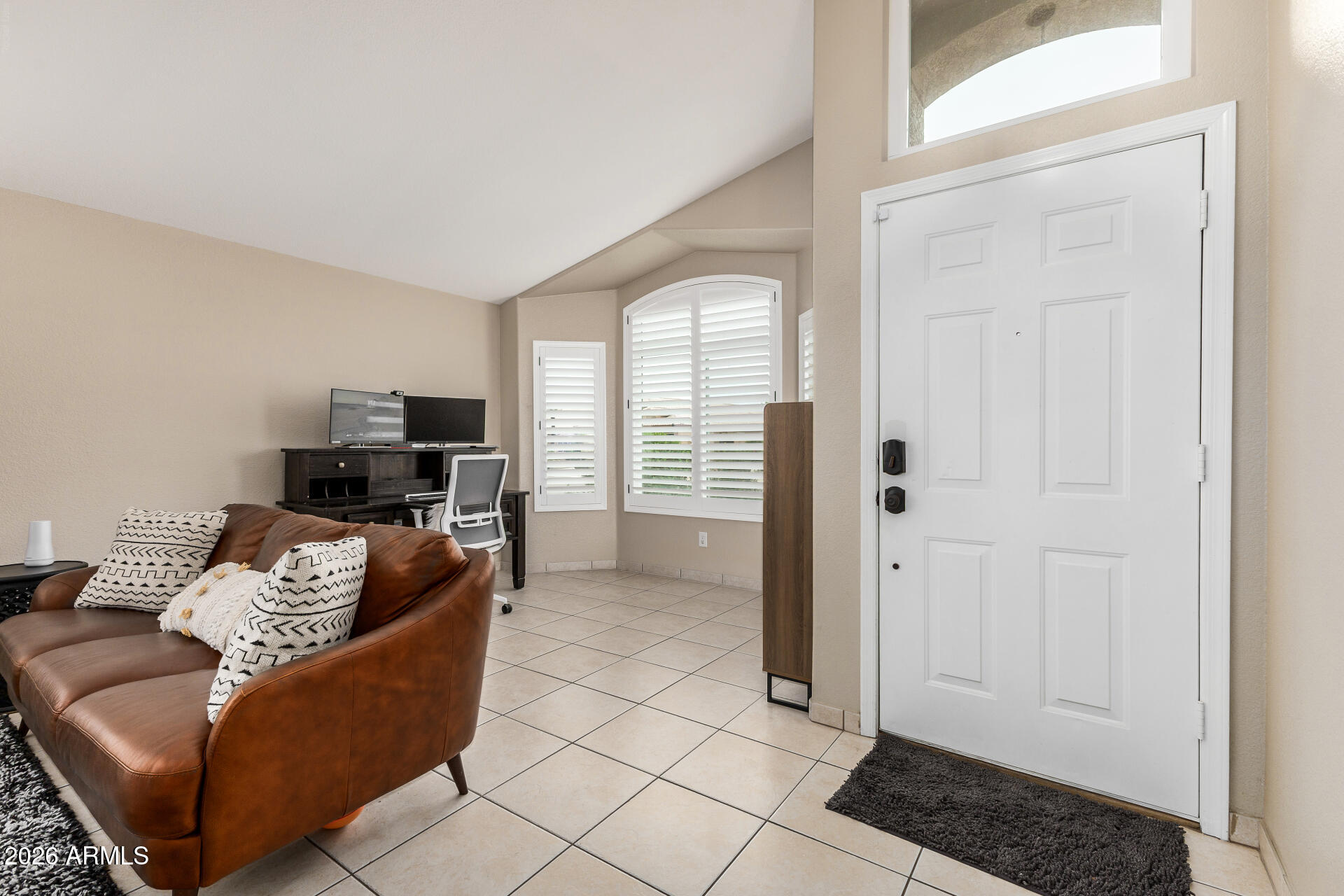159 West Gail Drive Gilbert, AZ 85233 - Photo 9 of 46 a living room with furniture and a window