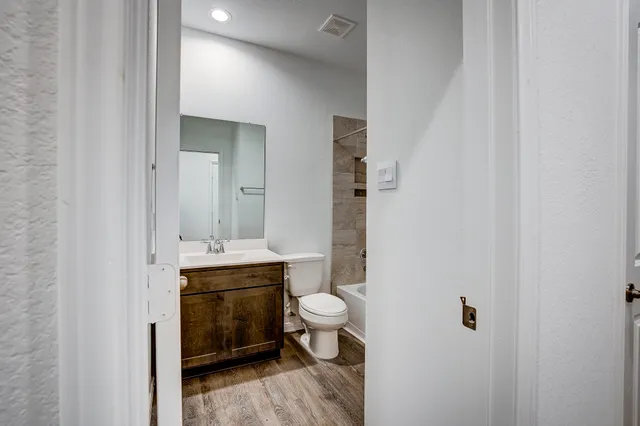 a bathroom with a sink and a bathtub