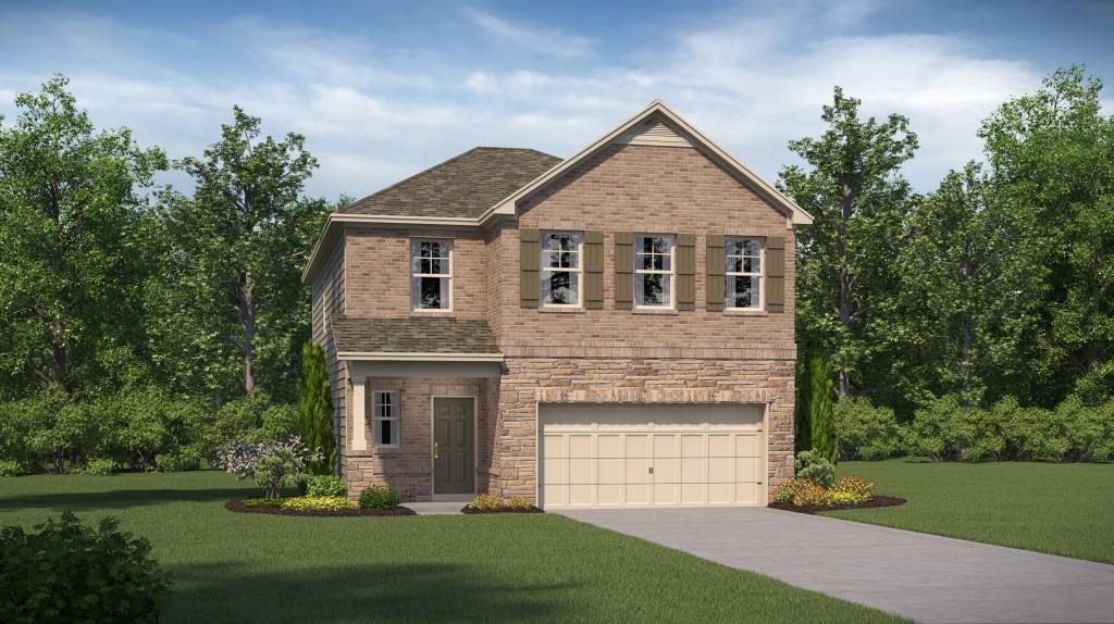 528 Almere Drive Hampton, GA 30228 - Photo 1 of 1 a front view of a house with a yard and garage