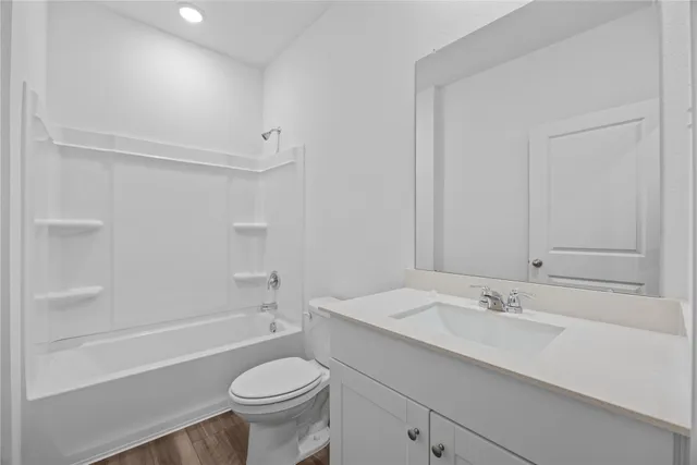 a bathroom with a shower and a toilet