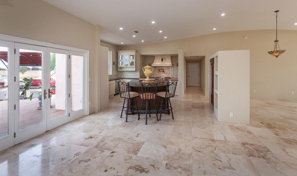 21190 East Acampo Road Clements, CA 95227 - Photo 15 of 89 a view of a dining room with furniture