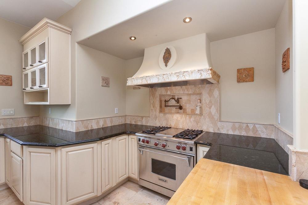 21190 East Acampo Road Clements, CA 95227 - Photo 18 of 89 a kitchen with stainless steel appliances granite countertop a sink stove and cabinets