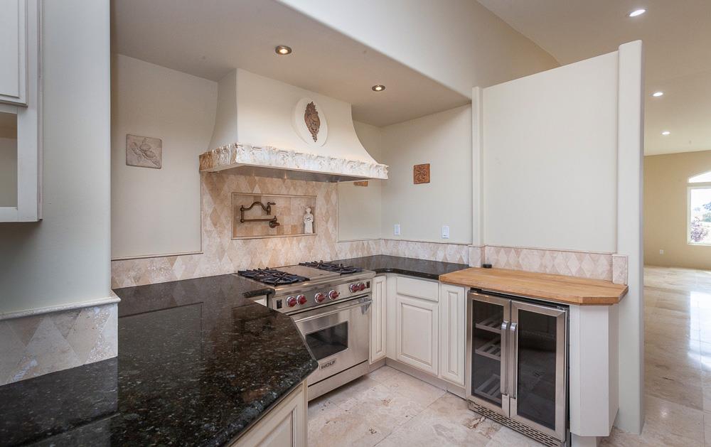 21190 East Acampo Road Clements, CA 95227 - Photo 20 of 89 a kitchen with a stove and a sink
