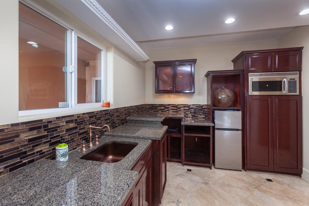 21190 East Acampo Road Clements, CA 95227 - Photo 43 of 89 a kitchen with stainless steel appliances granite countertop a sink stove and refrigerator