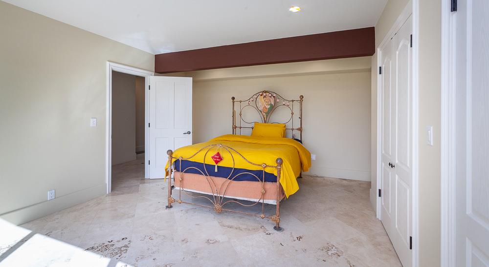 21190 East Acampo Road Clements, CA 95227 - Photo 51 of 89 a room that has a bed and a table in it