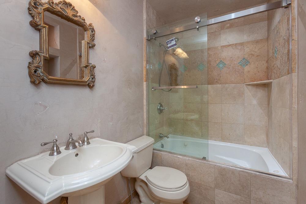 21190 East Acampo Road Clements, CA 95227 - Photo 59 of 89 a bathroom with a sink toilet and shower