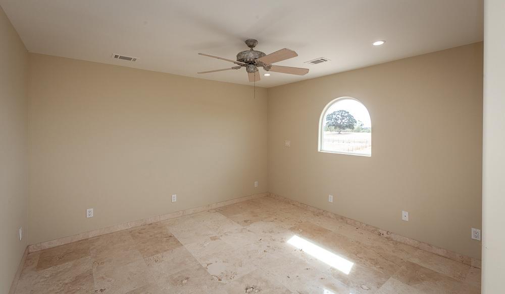 21190 East Acampo Road Clements, CA 95227 - Photo 65 of 89 an empty room with a window and a fan