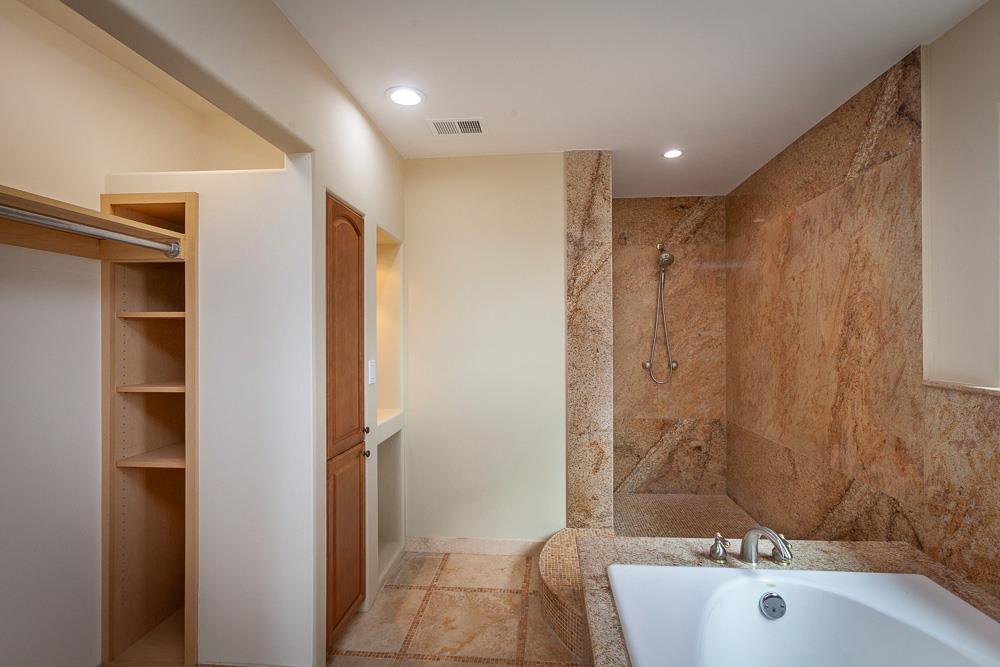 21190 East Acampo Road Clements, CA 95227 - Photo 67 of 89 a bathroom with a bathtub and shower