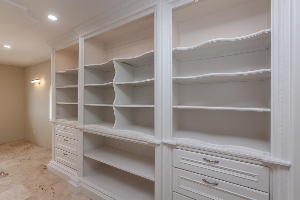 21190 East Acampo Road Clements, CA 95227 - Photo 70 of 89 a view of walk in closet with empty racks