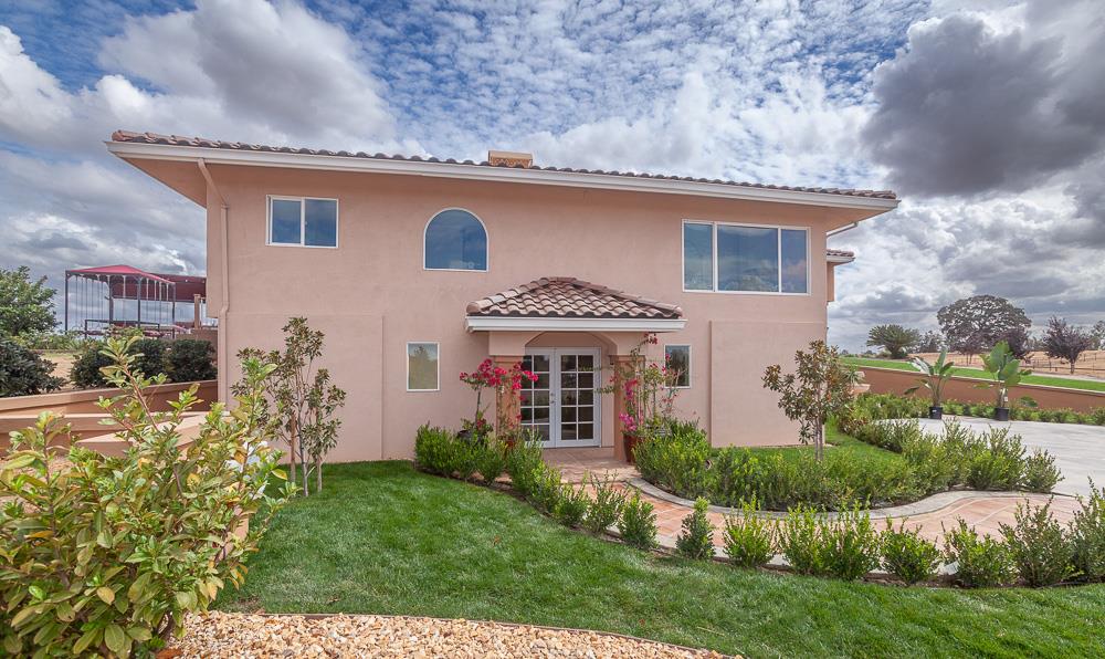 21190 East Acampo Road Clements, CA 95227 - Photo 84 of 89 a front view of a house with a yard