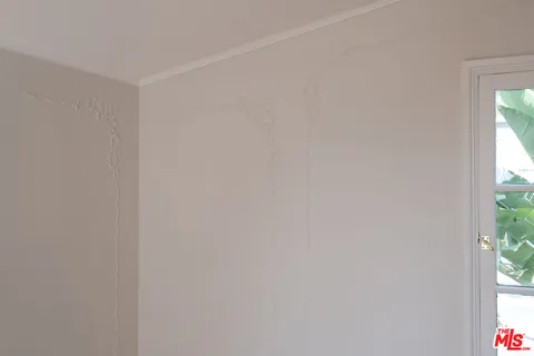 a view of a window in a white room