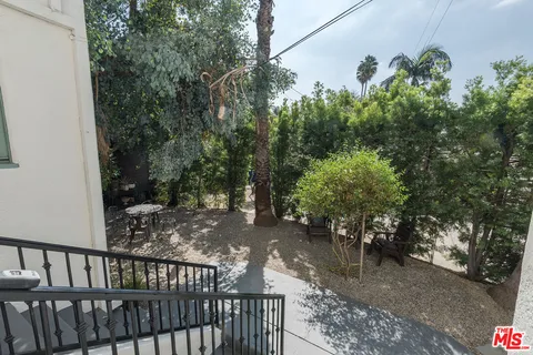 a view of backyard with green space