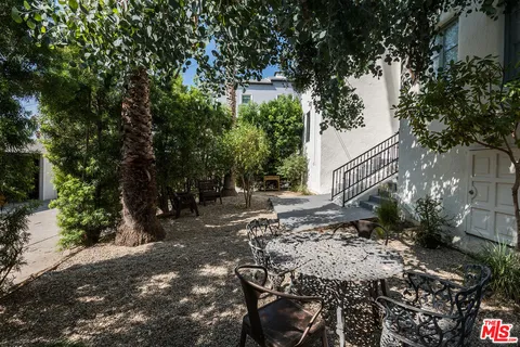 a view of backyard with green space