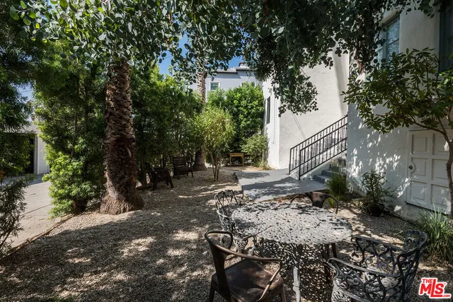 a view of backyard with green space