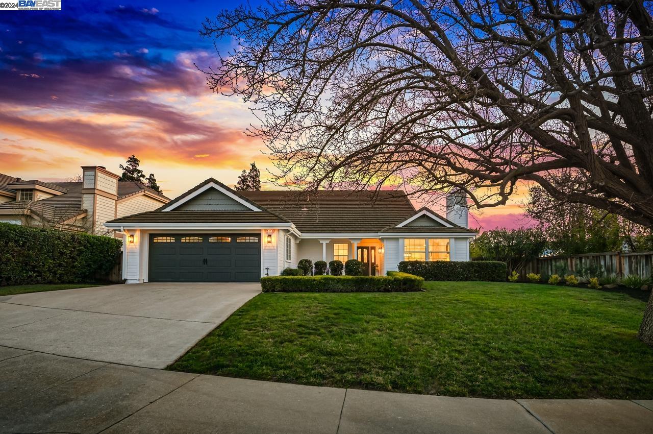 5058 Monaco Drive Pleasanton, CA 94566 - Photo 1 of 1 a front view of a house with a yard
