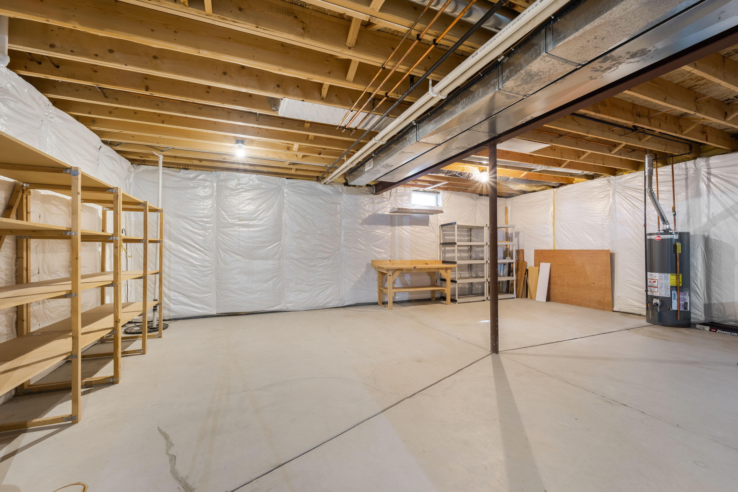 1864 River Lakes Road South Oconomowoc, WI 53066 - Photo 28 of 44 Insulated Walls, Poured Concrete Foundation, 9' Ceilings & more!