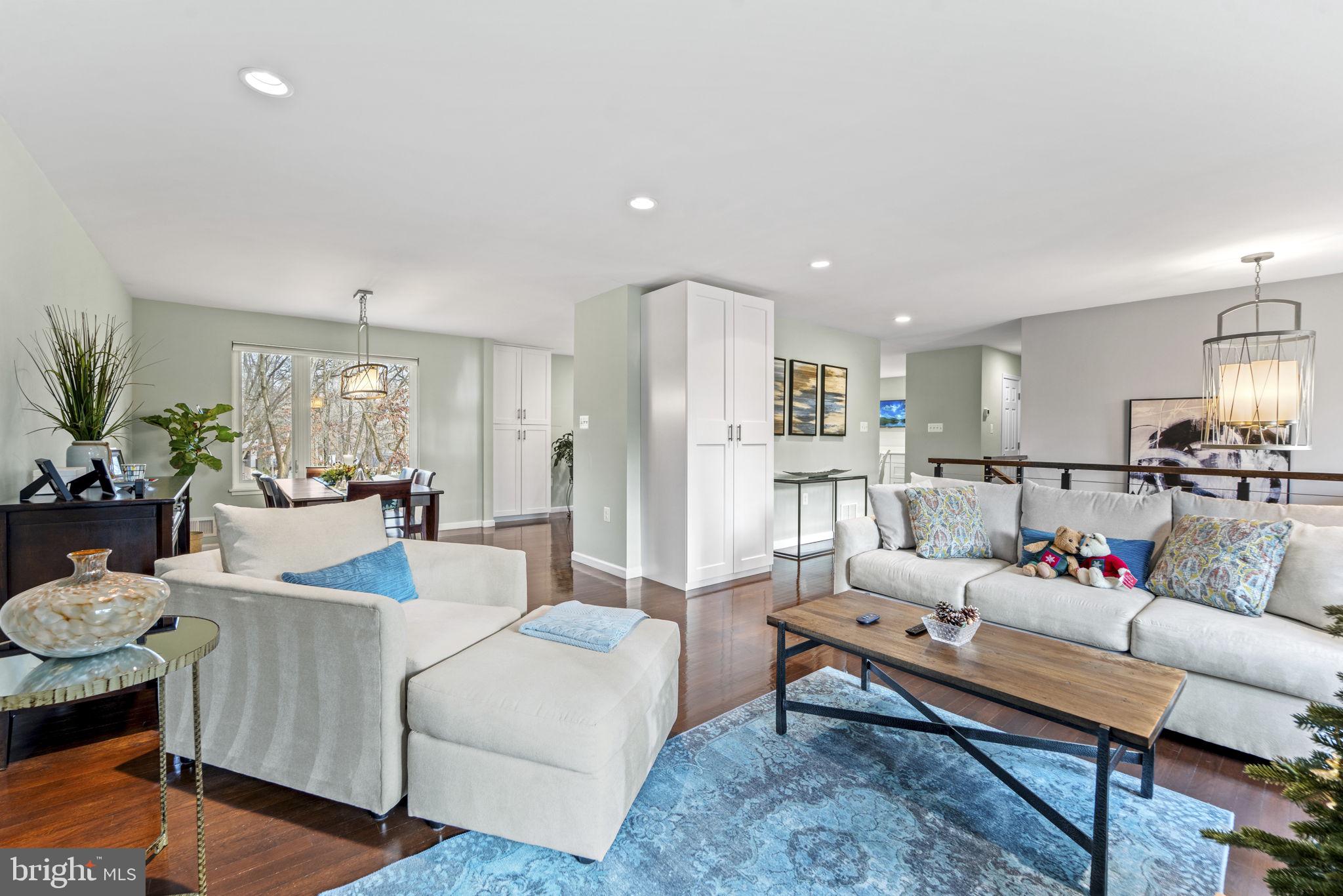 1411 Aldenham Lane Reston, VA 20190 - Photo 5 of 23 a living room with furniture and wooden floor