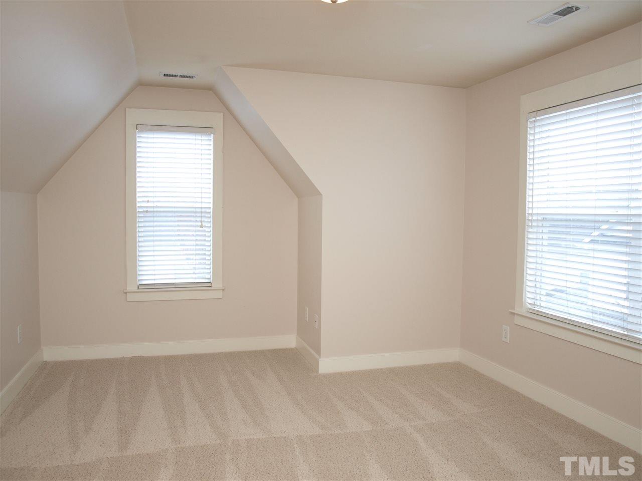 4531 All Points View Way Raleigh, NC 27614 - Photo 11 of 23 an empty room with a window