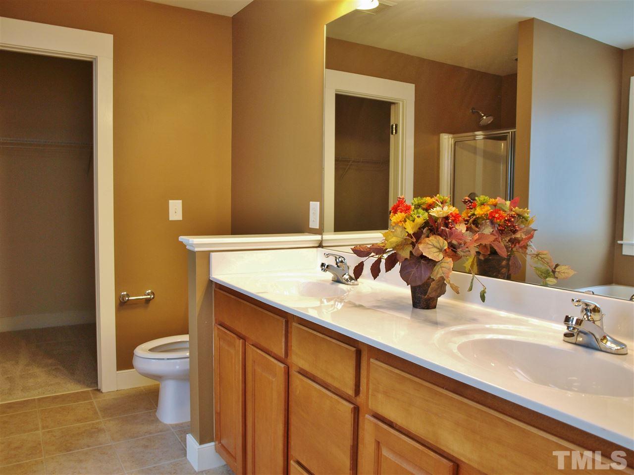 4531 All Points View Way Raleigh, NC 27614 - Photo 8 of 23 a bathroom with a sink and a toilet