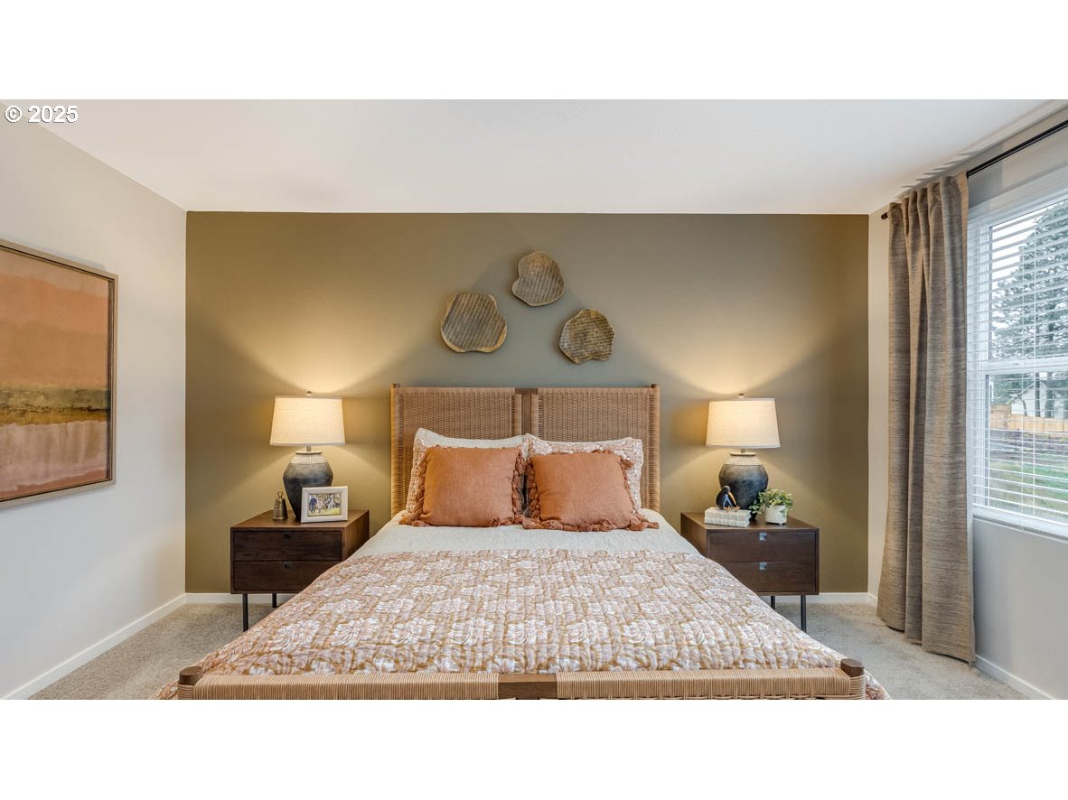 6161 Southeast 15th Street Gresham, OR 97080 - Photo 20 of 34 a bedroom with a bed and window