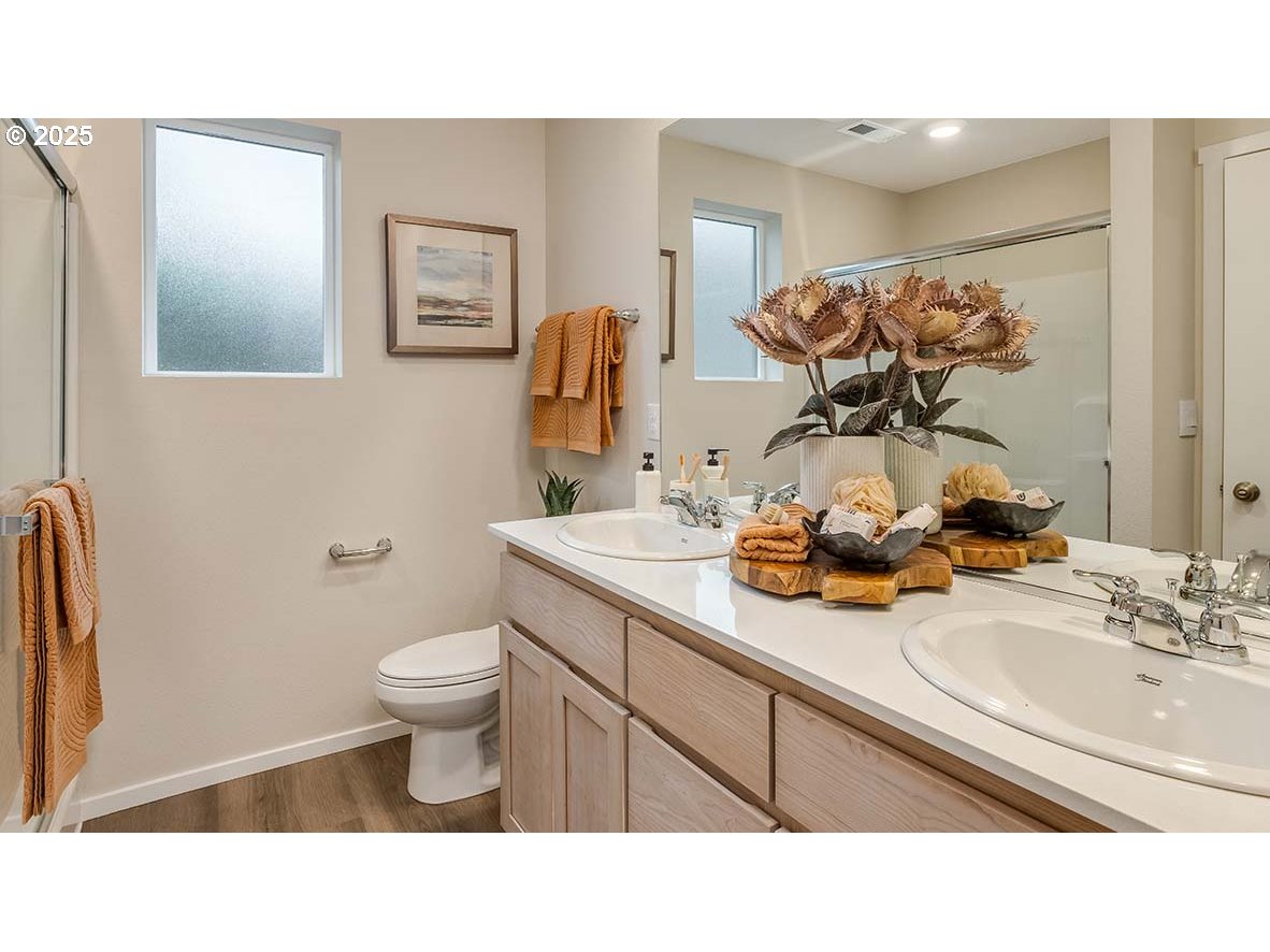 6161 Southeast 15th Street Gresham, OR 97080 - Photo 21 of 34 a bathroom with a sink toilet and mirror