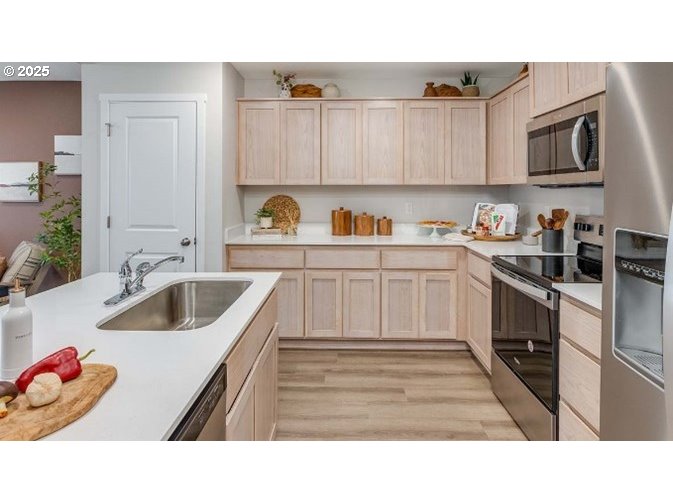 6161 Southeast 15th Street Gresham, OR 97080 - Photo 5 of 34 a kitchen with a sink cabinets and window
