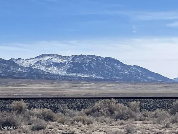 a view of a house with a mountain